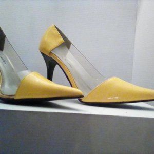 Bright yellow and clear pointy toe pumps. Great springtime shoes! Unworn.